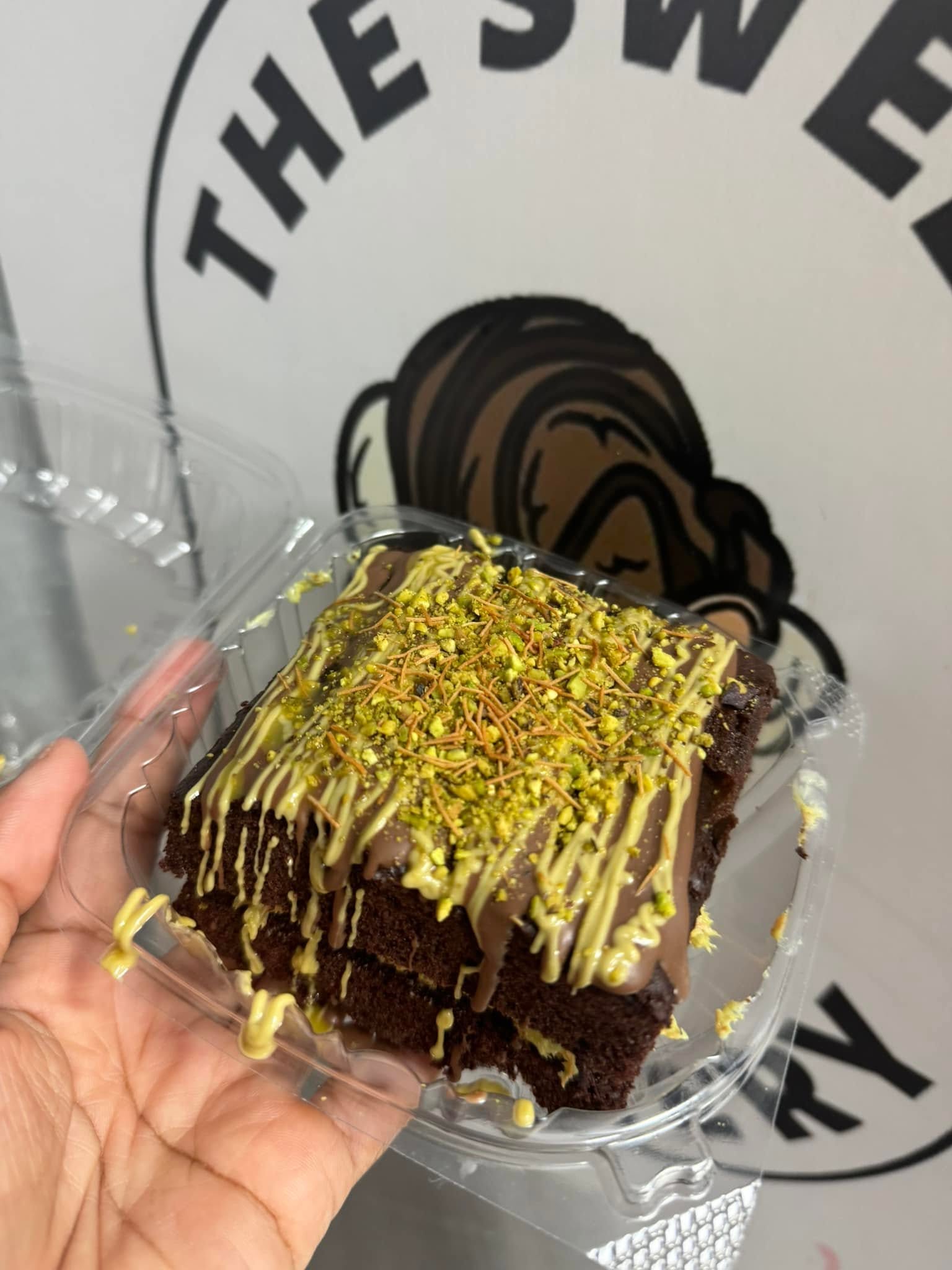 Pistachio kunafa chocolate cake slice
